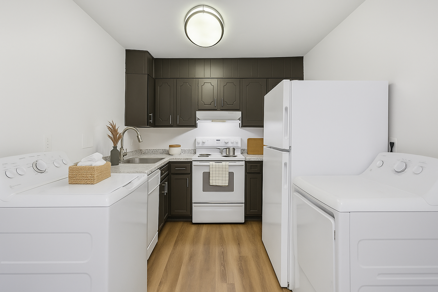 a kitchen with white cabinets and white appliances